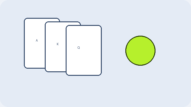 Illustration of playing cards beside a lime game token